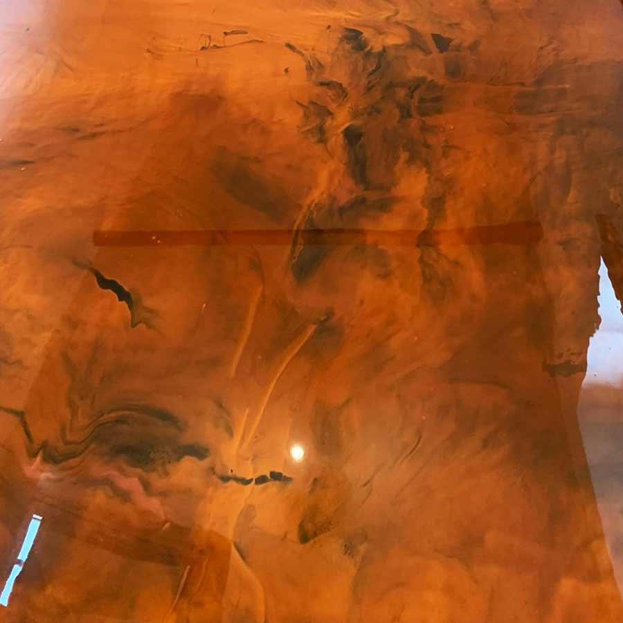 Metallic epoxy floor installation with decorative pattern