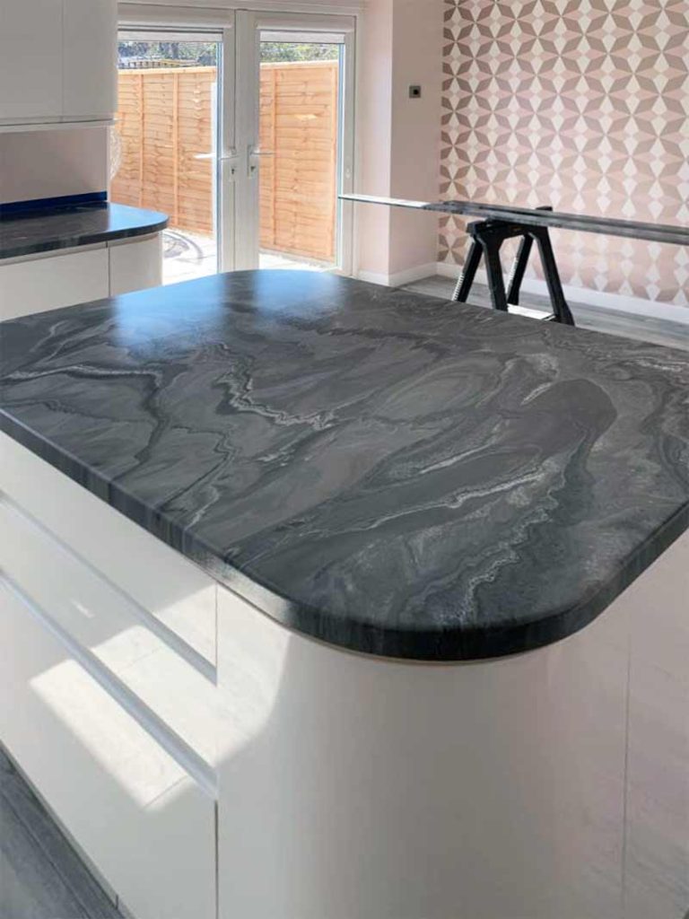 Metallic epoxy resin kitchen worktop installation